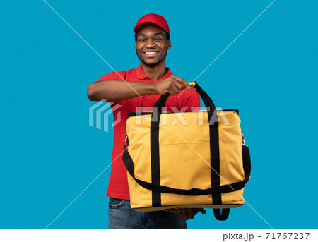 African american delivery man posing with thermo bag African american delivery man posing with thermo bag 71767237