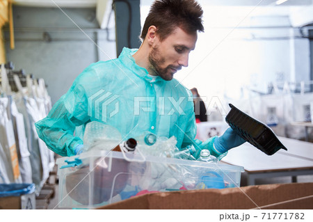 Man distributing different wastes Man distributing different wastes 71771782