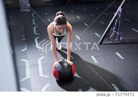 Sporty girl in gym Sporty girl in gym 71774271