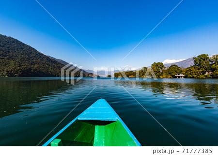 Canoe in the lake of Pokhara on Nepal 71777385