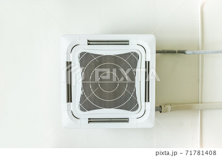 Ceiling mounted cassette type air conditioner in the office buildings, cafes or studios Ceiling mounted cassette type air conditioner in the office buildings, cafes or studios 71781408