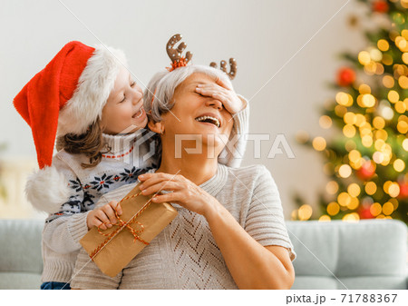 family celebrating Christmas 71788367
