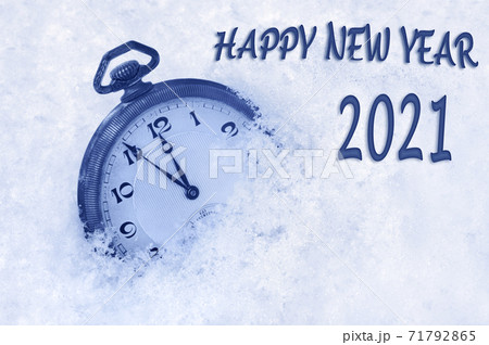 Happy new year card, New Year 2021 greeting in English language, pocket watch in snow, happy new year 2021 text, countdown to midnight Happy new year card, New Year 2021 greeting in English language, pocket watch in snow, happy new year 2021 text, countdown to midnight 71792865