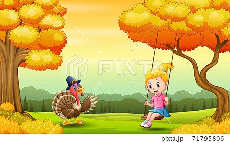 A girl playing swings in the autumn landscape 71795806