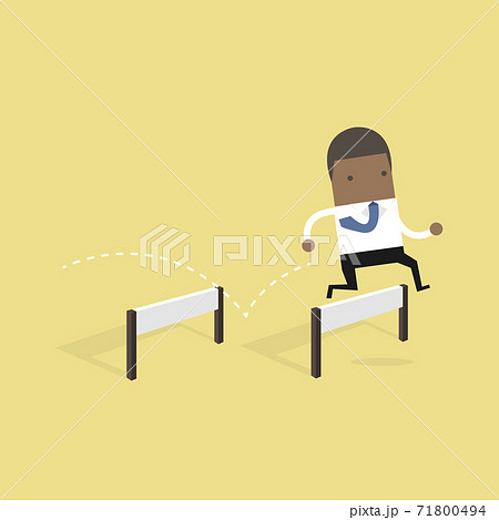 African businessman jumping over hurdle. 71800494