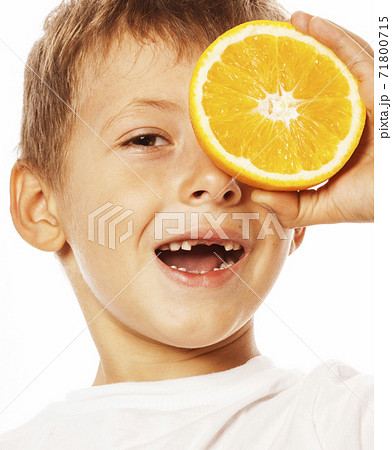 little cute boy with orange fruit double isolated on white smiling without front teeth adorable kid cheerful little cute boy with orange fruit double isolated on white smiling without front teeth adorable kid cheerful 71800715