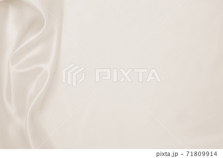 Smooth elegant golden silk or satin luxury cloth texture as wedding background. Luxurious background design. In Sepia toned. Retro style 71809914