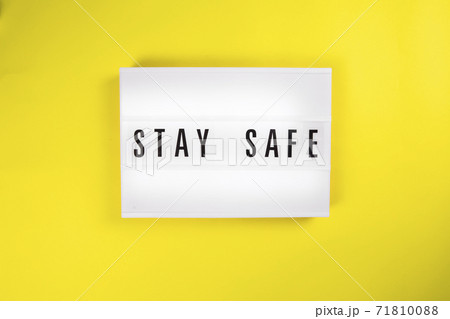 Stay Safe message on lightbox on yellow background isolated 71810088