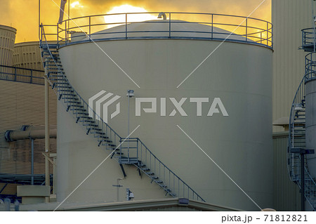 Cylindrical container at a Power Plant in Utah Valley against sky at sunset 71812821