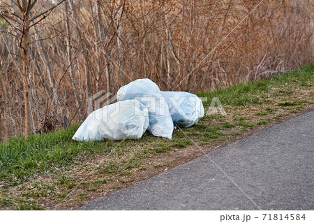 Bags of rubbish on the roadside Bags of rubbish on the roadside 71814584