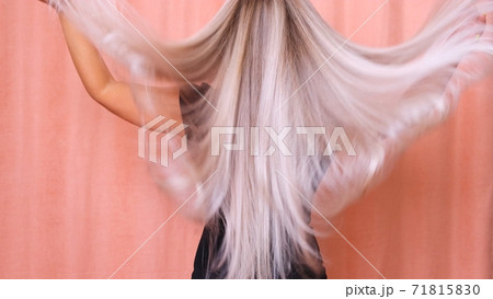 long blond hair of a young girl, backside view. long blond hair of a young girl, backside view. 71815830
