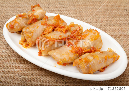 Delicious homemade cabbage rolls stuffed with rice and meat on dish. Delicious homemade cabbage rolls stuffed with rice and meat on dish. 71822805