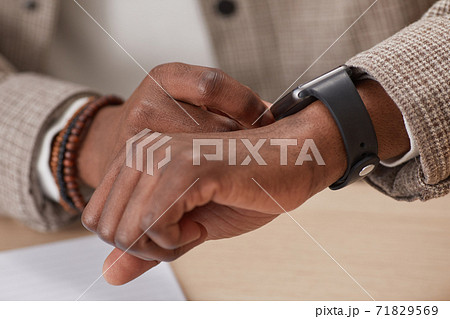Man using smart watch Man using smart watch 71829569