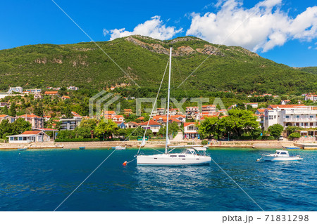 Yachts near the Adriatic coast in the Bay of Kotor, Montenegro 71831298