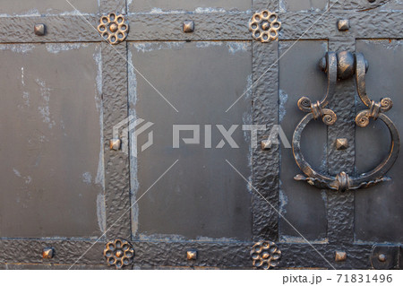 Close-up of the old iron black door 71831496