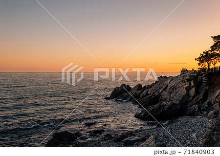 Sunset of Haeundae Dongbaekseom island and sea in Busan, Korea 71840903