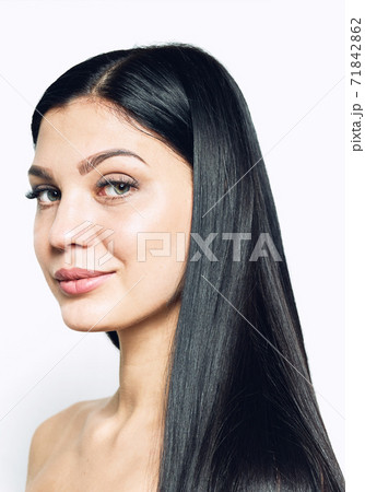 Beauty face of a Beautiful young girl with black shiny long hair and green eyes Beauty face of a Beautiful young girl with black shiny long hair and green eyes 71842862