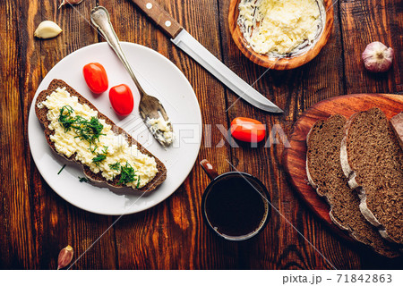Rye bread toast with processed cheese and garlic Rye bread toast with processed cheese and garlic 71842863