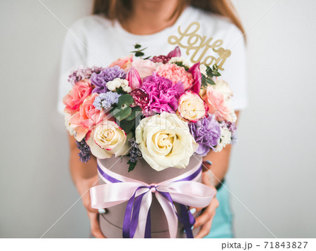 Beautiful bouquet in woman hand Beautiful bouquet in woman hand 71843827