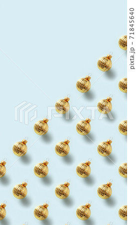 Christmas pattern of golden balls on blue. 71845640