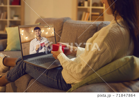 Young man and woman in love having virtual date via video call on Valentine's Day Young man and woman in love having virtual date via video call on Valentine's Day 71847864