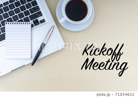 KICKOFF MEETING text with fountain pen, notepad, laptop and cup of coffee on wooden background KICKOFF MEETING text with fountain pen, notepad, laptop and cup of coffee on wooden background 71854622