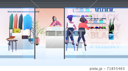 women choosing handbags in fashion boutique black friday big sale promotion discount concept 71855463