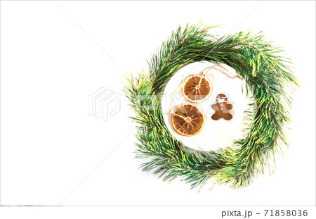 Christmas composition. Cookies in the form of a man in a mask. Holiday concept in the context of the coronavirus pandemic 71858036