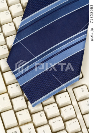 Blue Necktie and Keyboard Blue Necktie and Keyboard 71858663
