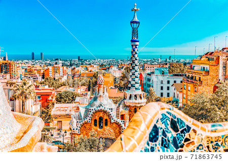 :Gorgeous and amazing Park Guel in Barcelona. In 1984 park has been declared UNESCO by the World heritage of mankind. Park Guell (1914) is the famous architectural town 71863745