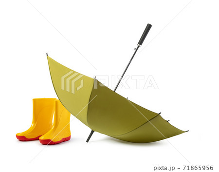green umbrella and gumboots 71865956