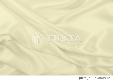 Smooth elegant golden silk or satin luxury cloth texture as wedding background. Luxurious background design. In Sepia toned. Retro style Smooth elegant golden silk or satin luxury cloth texture as wedding background. Luxurious background design. In Sepia toned. Retro style 71868912