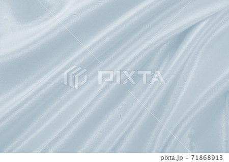 Smooth elegant grey silk or satin luxury cloth as wedding background. Luxurious background design Smooth elegant grey silk or satin luxury cloth as wedding background. Luxurious background design 71868913