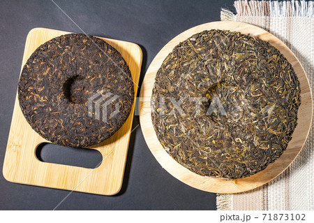 Chinese Tea Shu Shen Puer. Close-up. Pressed Tea. top view flat lay 71873102