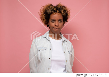 Young african american woman being depressed and worry for distress. 71873328