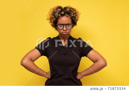 Young african american woman with glasses being depressed and worry for distress. Young african american woman with glasses being depressed and worry for distress. 71873334