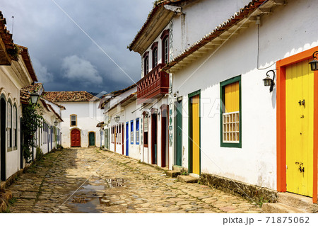 Old houses in colonial architecture and cobblestone streets Old houses in colonial architecture and cobblestone streets 71875062