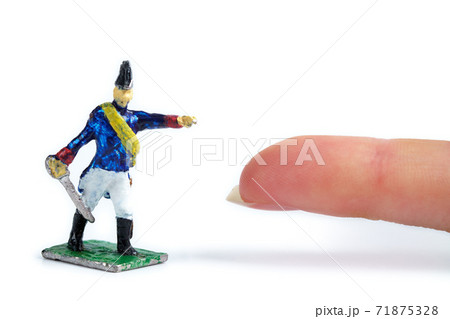 Shot of metal soldier's figurine on the white background 71875328
