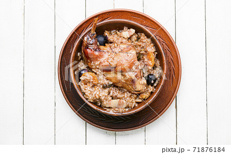 Delicious risotto with rabbit. 71876184