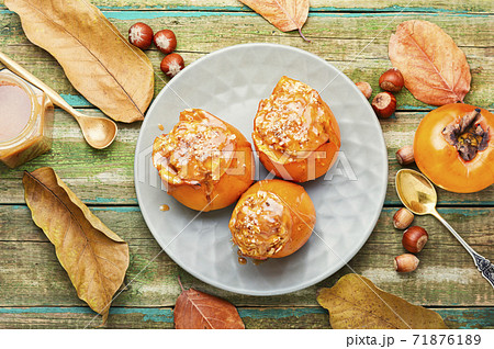 Baked stuffed persimmon Baked stuffed persimmon 71876189