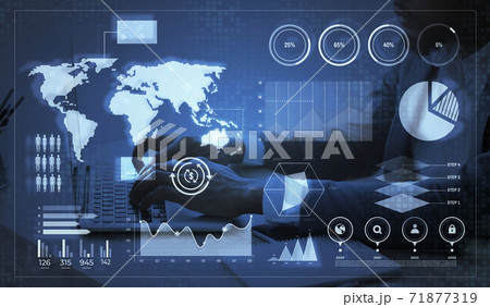 Global business analytics. Interactive screen with digital data layered over working businessman 71877319