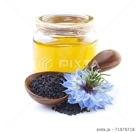 Black cumin oil on white background 71878718