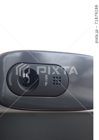 A modern web camera is installed on the body of a flat screen monitor. Device for video communication and recording of high quality video A modern web camera is installed on the body of a flat screen monitor. Device for video communication and recording of high quality video 71879286