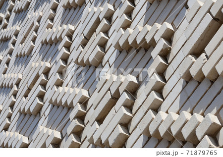 A pattern made of white bricks in the form of diamond shapes. Decoration of the walls during the Soviet Union 71879765