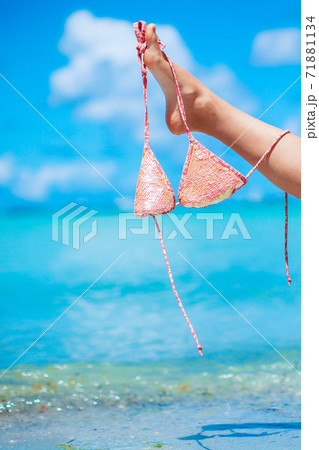 Closeup swimsuit on background of turquoise water Closeup swimsuit on background of turquoise water 71881134