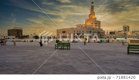 Al-Fanar Qatar Islamic Cultural Center in Doha Qatar daylight exterior view with clouds in sky in background 71881420