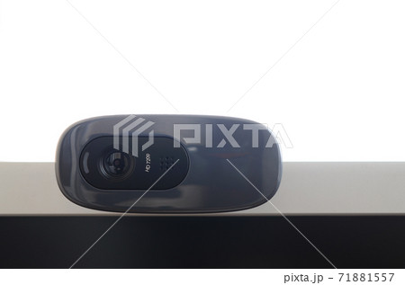 A modern web camera is installed on the body of a flat screen monitor. Device for video communication and recording of high quality video A modern web camera is installed on the body of a flat screen monitor. Device for video communication and recording of high quality video 71881557
