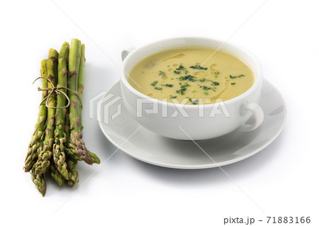 Fresh asparagus soup isolated on white background 71883166