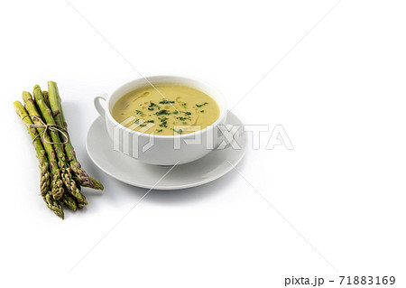 Fresh asparagus soup isolated on white background 71883169