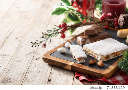 Assortment of Christmas nougat and marzipan. Copy space 71883199